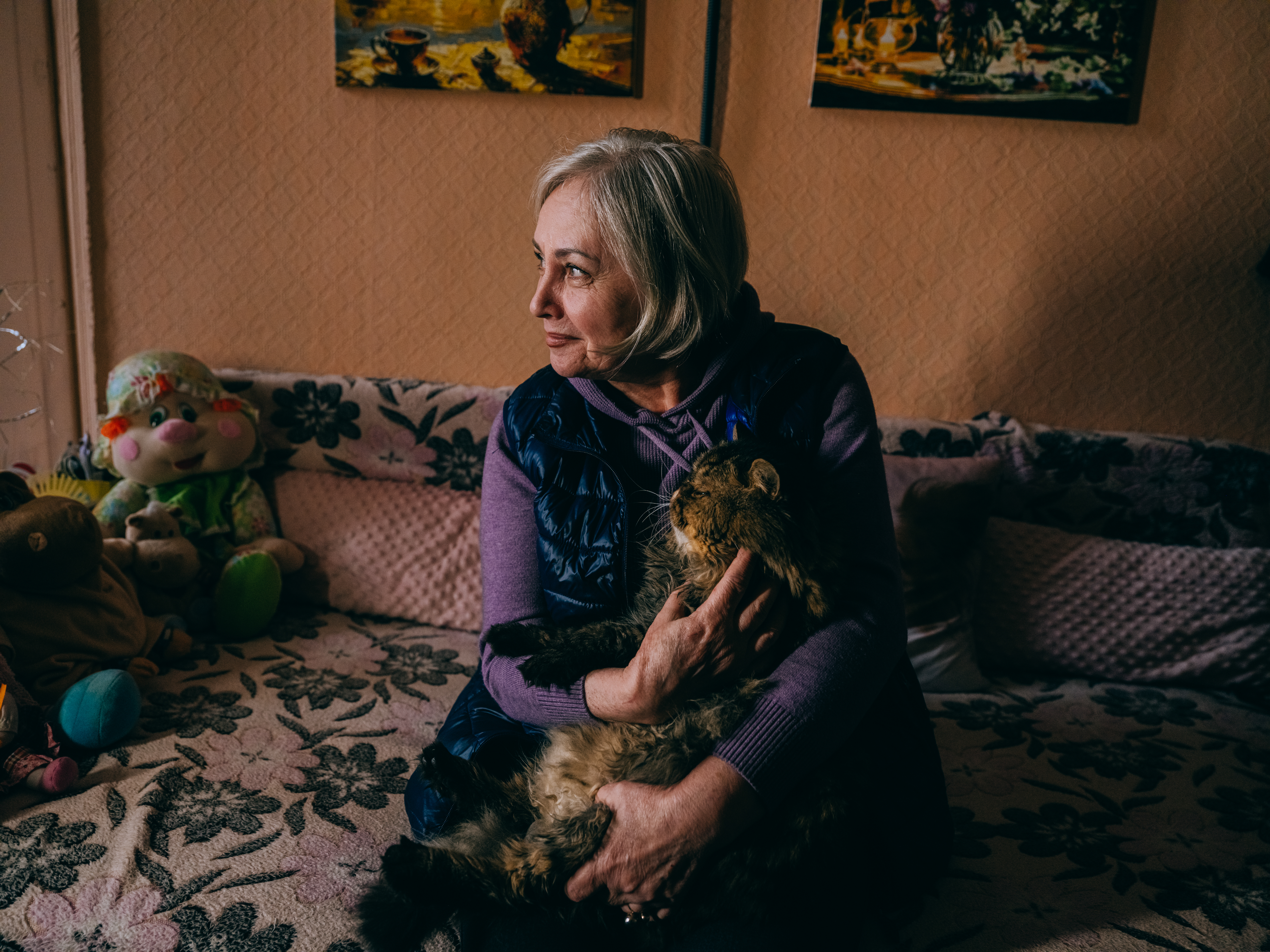 Liubov Kuzmenko (65) shares a room with her cat Kuzma. They left Siverskodonetsk in Luhansk region together.