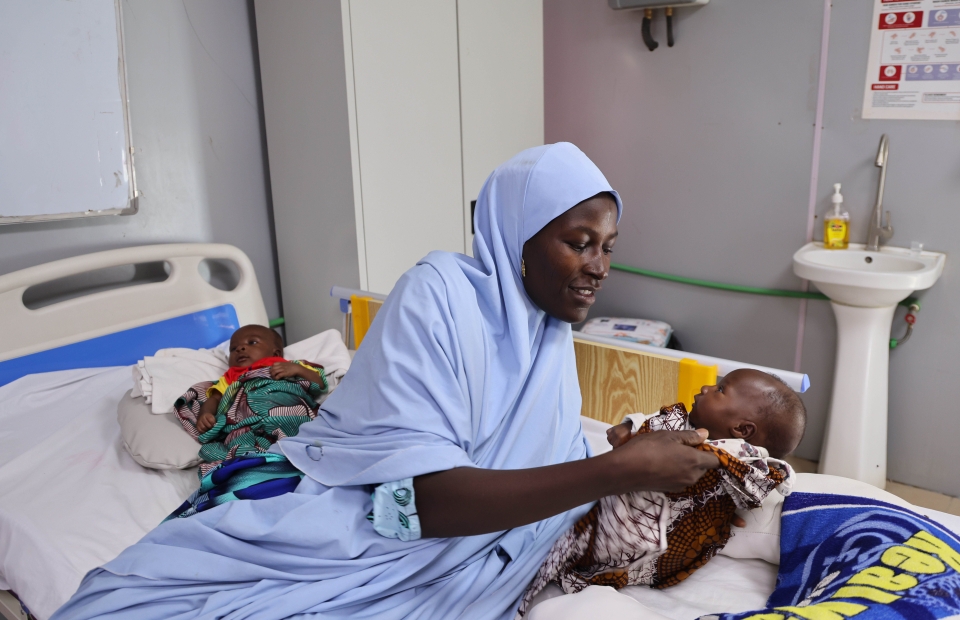 Une mama avec son bébé